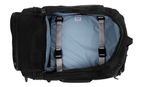 An open Techonaut 30 with a Black exterior and a Tidal (denim blue) interior.